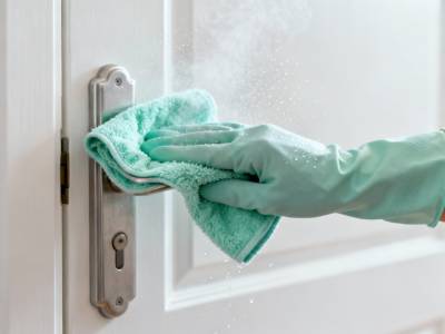 Disinfecting door handle with microfiber cloth